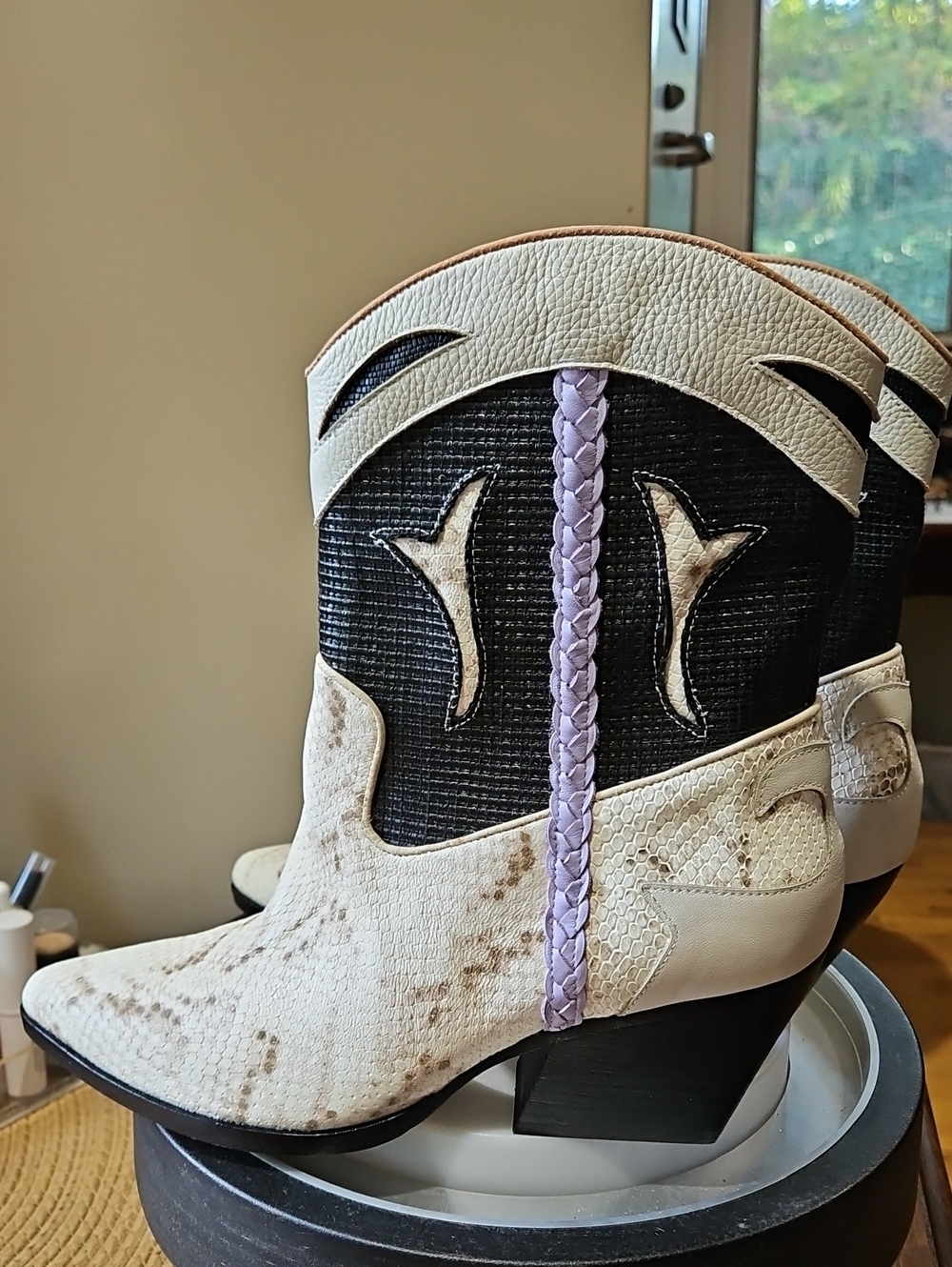 Dolce Vita Loral Boots A striking black-and-white snake print w/purple Braid